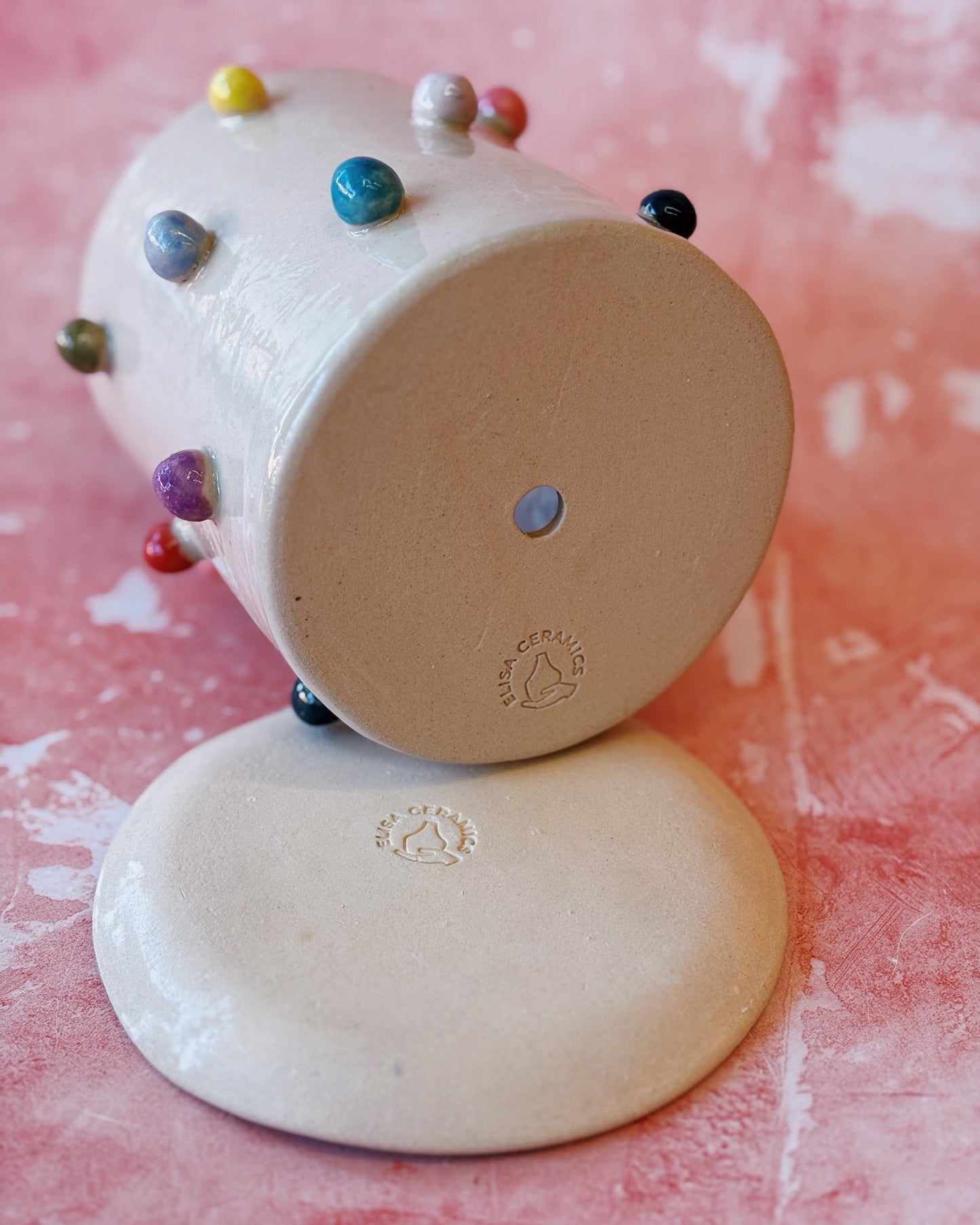 white ceramic planter showing Elisa Ceramics brand printed at bottom