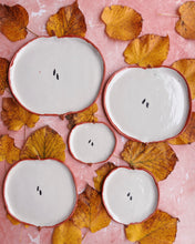 Load image into Gallery viewer, Apple Aperitivo Set featuring handmade stoneware plates surrounded by autumn leaves.