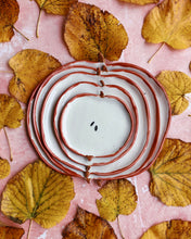 Load image into Gallery viewer, Apple Aperitivo Set featuring handmade stoneware plates on a backdrop of autumn leaves.