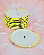 Carica l'immagine nel visualizzatore di Gallery, Handmade Apple Spoon Rest in stoneware, featuring a fun design with decorative yellow edges.