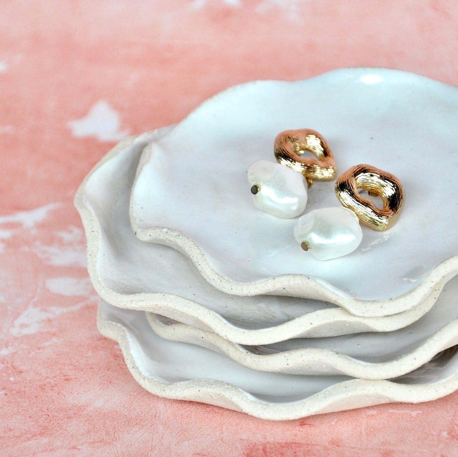 White plates customised for wedding rings