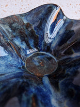 Load image into Gallery viewer, Close-up view of the Mercury Bowl, a handmade stoneware ceramic bowl featuring a unique blue glaze.
