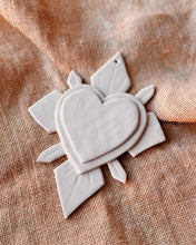 Load image into Gallery viewer, A white sacred heart made of ceramic
