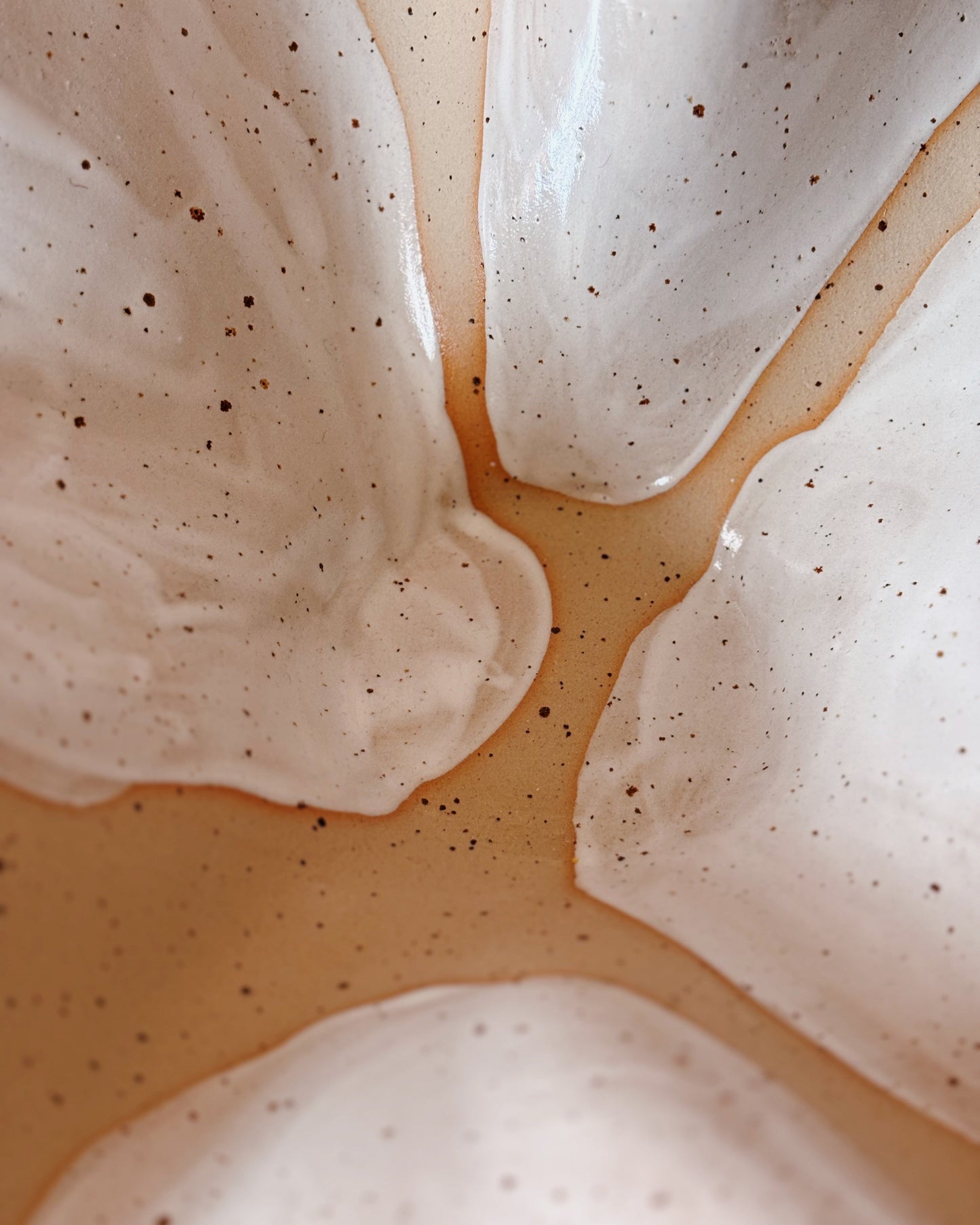 Close-up of meringue with a gradient of white to beige color.