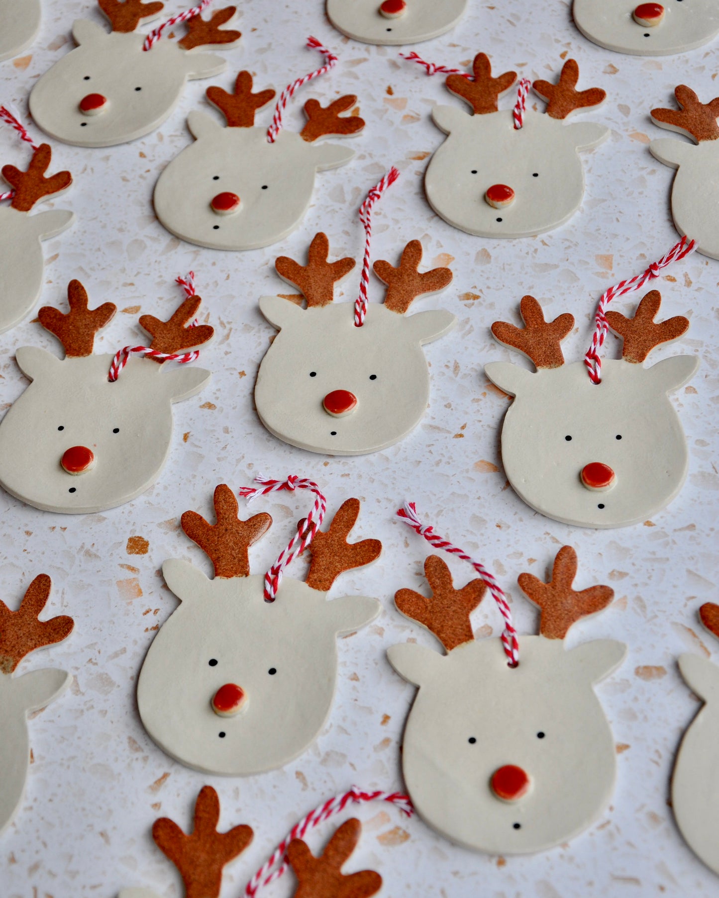 Rudolph Reindeers - Pack of 3, handmade stoneware Christmas decorations featuring cute reindeer faces.