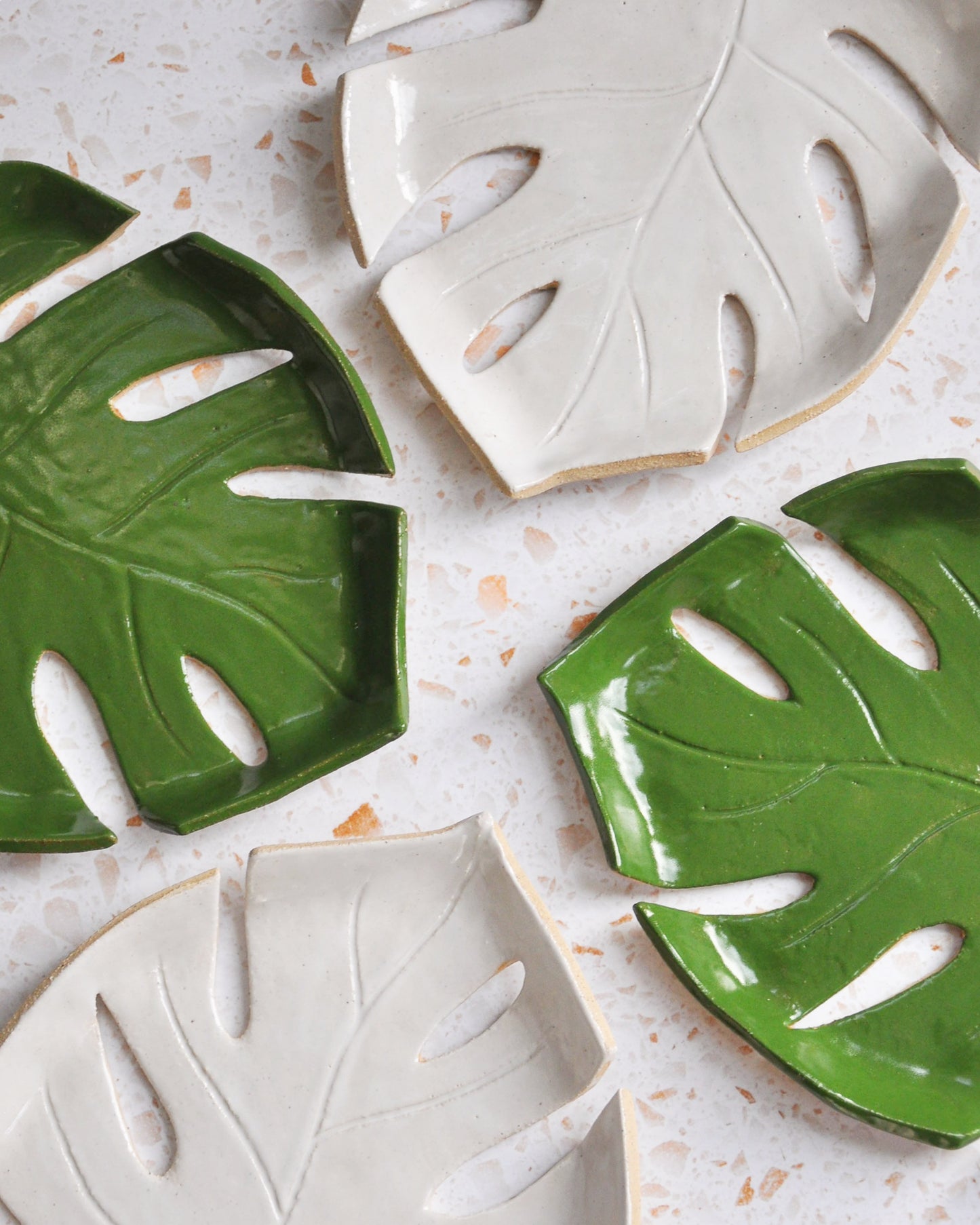 Monstera Leaf Plate set featuring handmade stoneware plates in green and white colors, perfect for jewellery and keys.